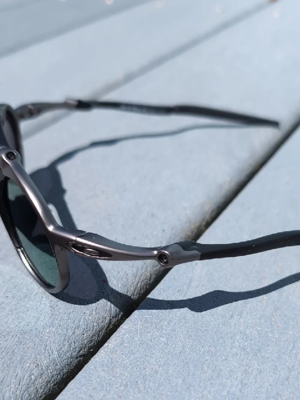 Oakley Madman Round Metal Black Silver Sunglasses with Polarized Mirrored Lenses